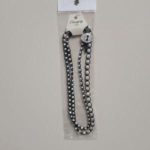 Corded necklace with silver beads and pearls